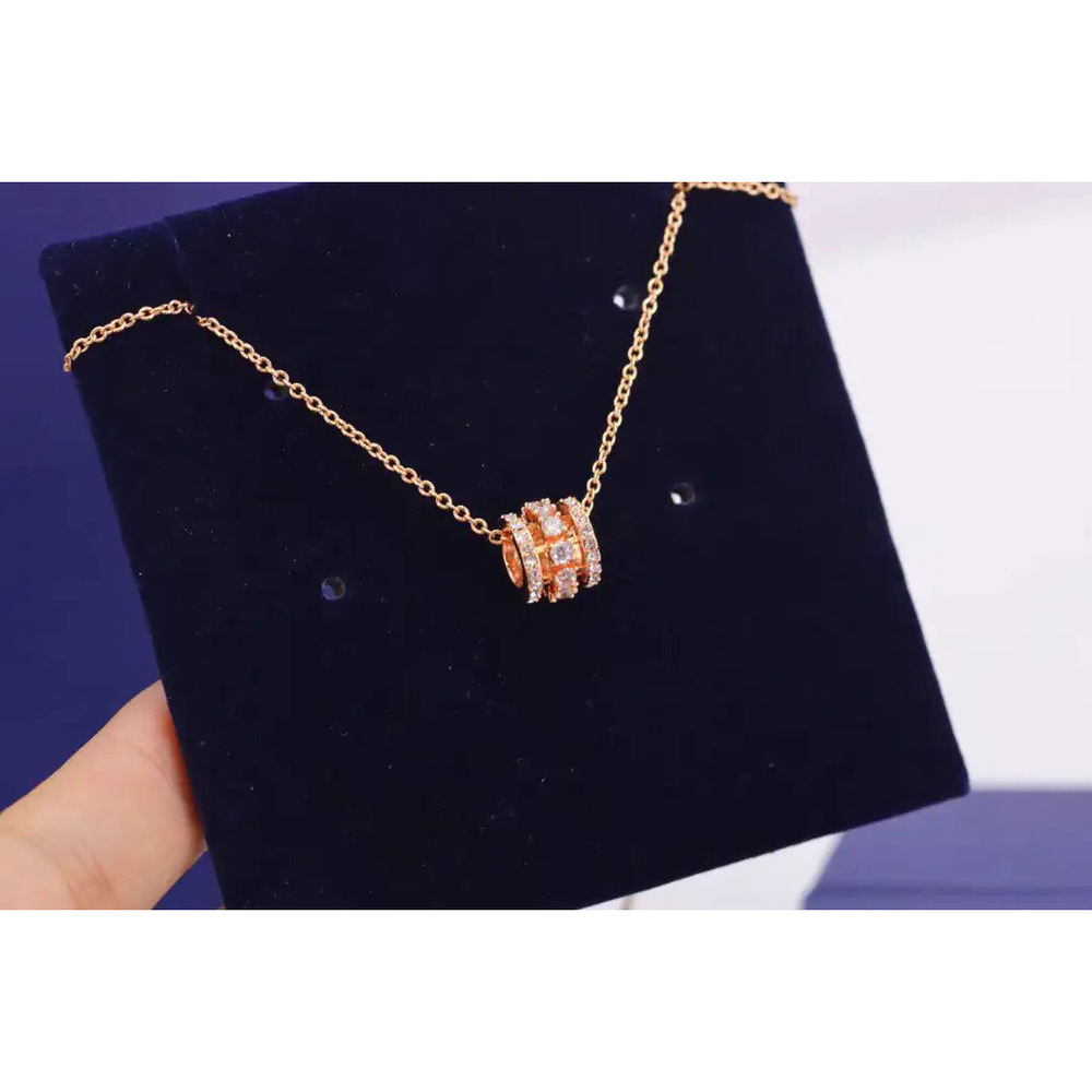 Swarovski Rose gold three-diamond lucky charm necklace